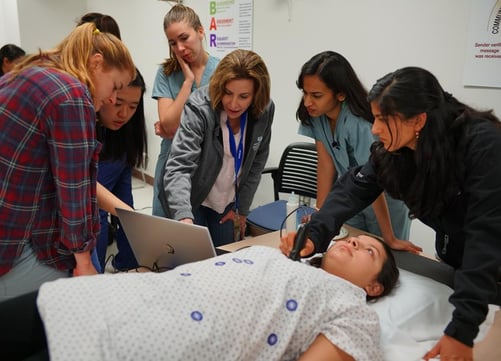 Learners use SonoSim LiveScan on a model to practice medical decision-making scenarios