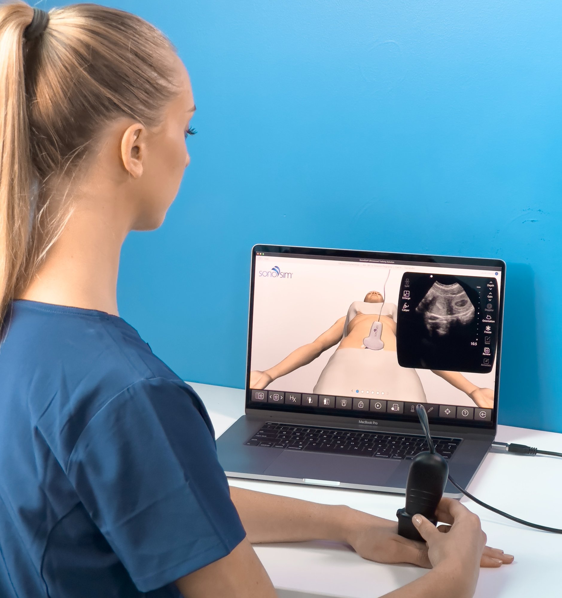 Nurse scanning on SonoSimulator Nurse scanning on SonoSimulator