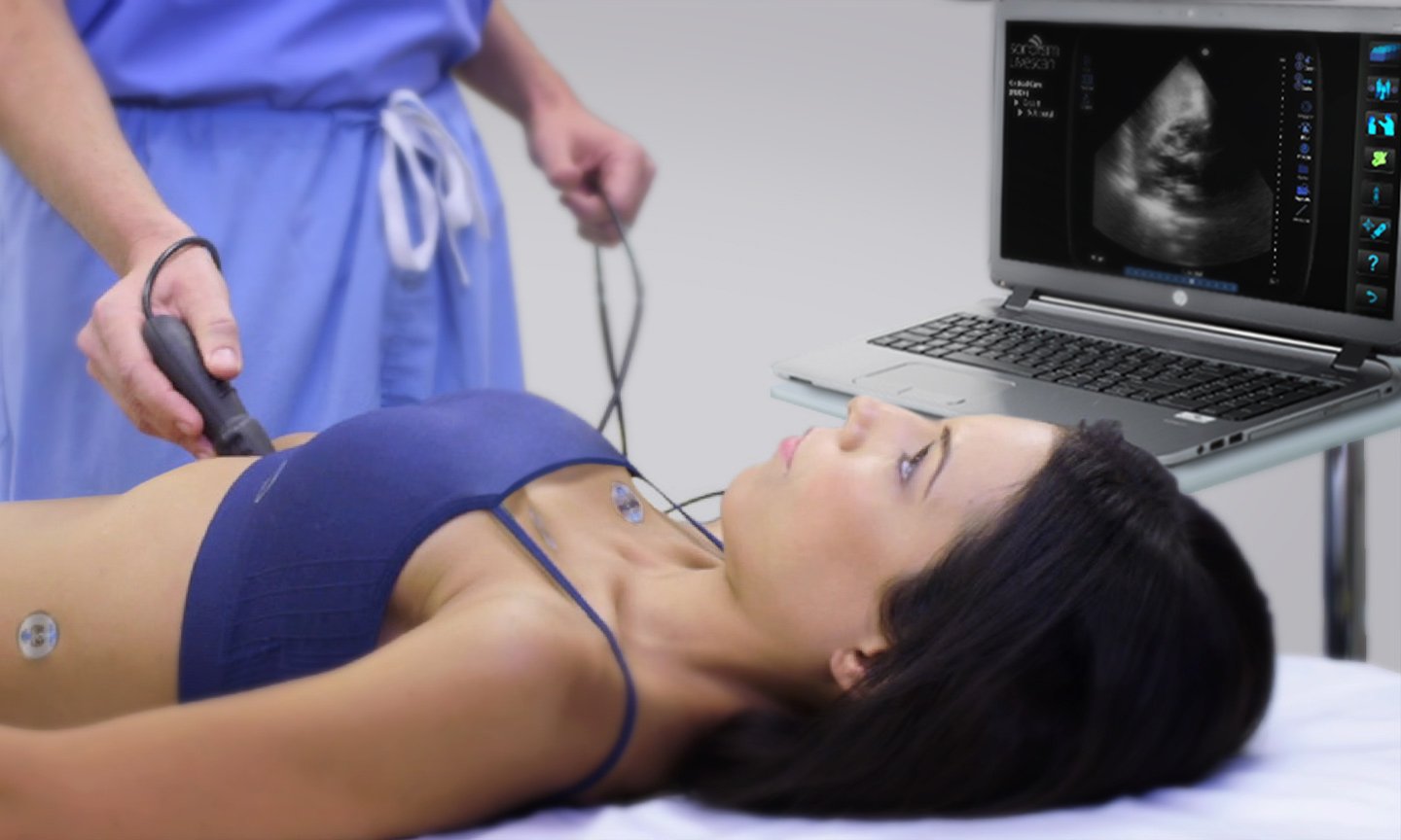 Student performing a simulated ultrasound scan on a live model with LiveScan
