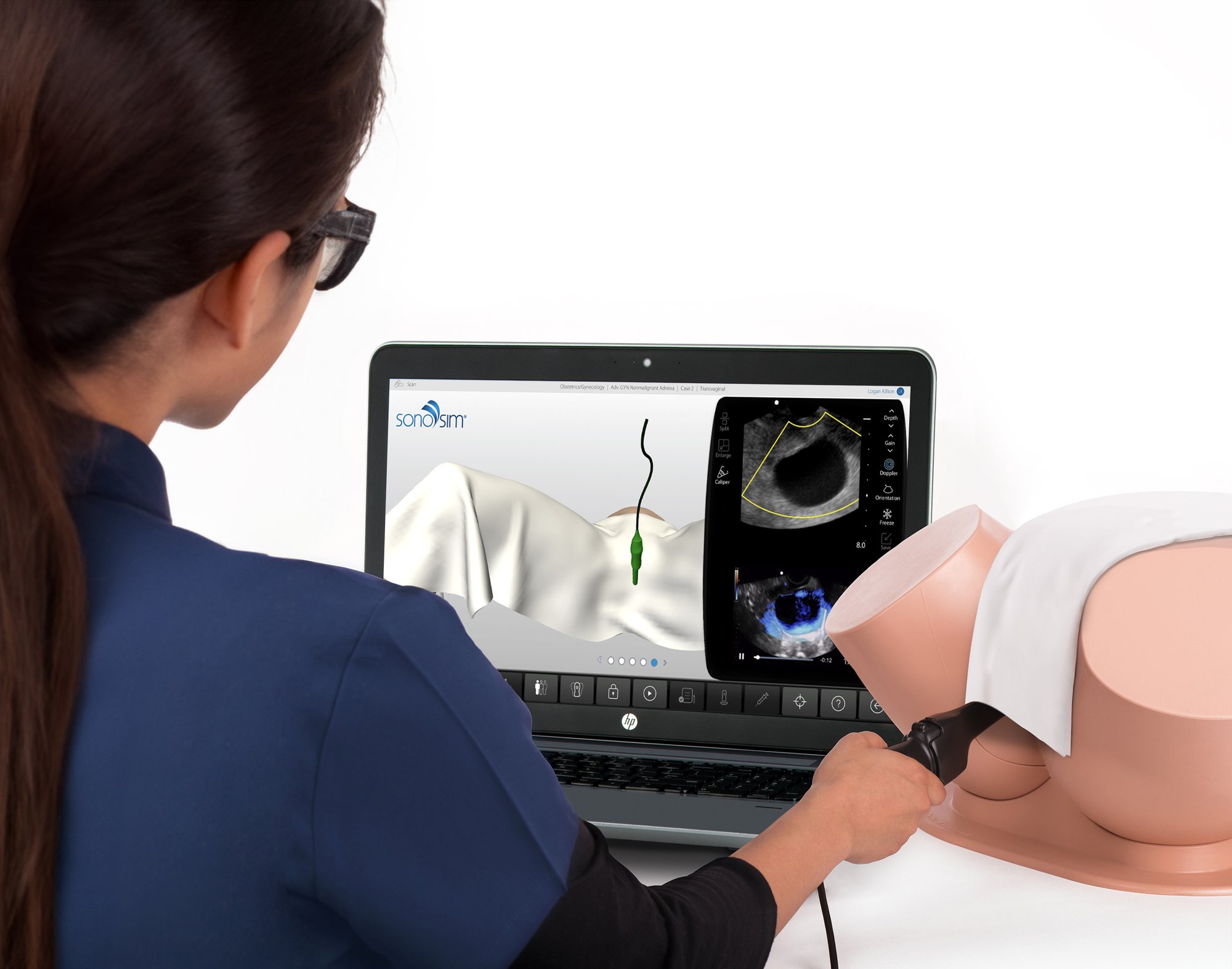 Learner performing an OB GYN ultrasound in the SonoSimulator
