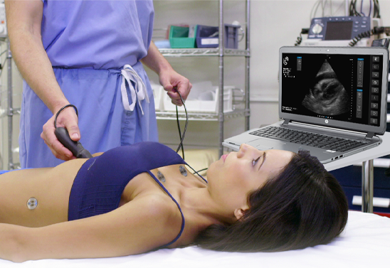 Student performing SonoSim LiveScan on a live model