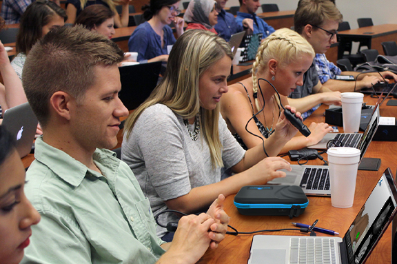 Medical students practicing ultrasound scanning with the SonoSimulator® during a SonoSim training session.