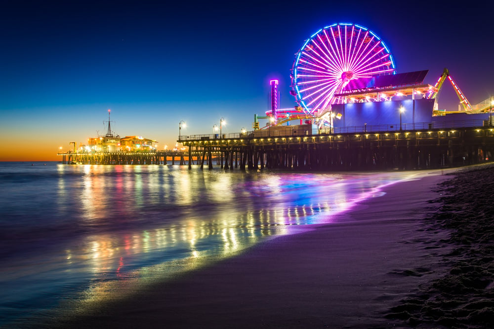 The Santa Monica pier lit up at night, near SonoSim's headquarters